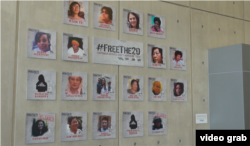 20名被要求释放妇女的照片在美驻联合国使团高挂