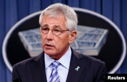FILE - U.S. Secretary of Defense Chuck Hagel makes remarks at the Pentagon in Washington, May 1, 2014.