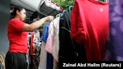 Pekerja Rumah Tangga (PRT) adalah profesi yang berada dalam posisi rentan, terutama di Indonesia. (Foto: REUTERS/Zainal Abd Halim)