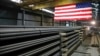 FILE - Steel rods produced at the Gerdau Ameristeel mill await shipment in St. Paul, Minn., May 9, 2019. Presidential candidate Donald Trump promises new tariffs if elected, saying the U.S. is being taken advantage of by other countries due to its trade policy. 