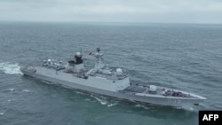 Фото без дати, опубліковане військом Китаю 24 травня 2024 року: корабель китайських ВМС під час навчань Joint Sword-2024