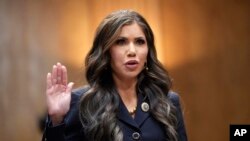 South Dakota Governor Kristi Noem, President-elect Donald Trump's nominee to be Secretary of Homeland Security, is sworn in for her confirmation hearing at the Capitol in Washington on Jan. 17, 2025.
