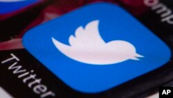 Aplikasi Twitter di layar sebuah ponsel. (Foto:Ilustrasi)