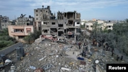 加沙中部地区难民营“马加齐”被以色列轰炸。（2023年12月25日）