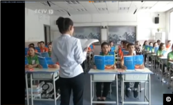 Screenshot from a CCTV report on "vocational training facility" in Xinjiang.