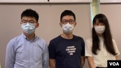 黃之锋（左起）、罗冠聪及周庭。 (美国之音汤惠芸拍摄)