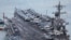 ກຳປັ່ນບັນທຸກເຮືອບິນ USS Carl Vinson ຂອງສະຫະລັດ ເດີນທາງເຖິງຖານທັບເຮືອເກົາຫຼີໃຕ້ ໃນລະຫວ່າງການຢ້ຽມຢາມທ່າເຮືອ Busan ທາງພາກຕາເວັນອອກສຽງໃຕ້ ຂອງນະຄອນ Busan ໃນວັນທີ 2 ມີນາ 2025.