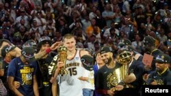 丹佛掘金队击败迈阿密热火队赢得2022-23年美国国家篮球协会冠军。（2023年6月12日）
