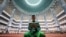 <p>Seorang pria Muslim membaca Al-Qur'an di Masjid Agung Istiqlal selama bulan puasa Ramadan di Jakarta. (Reuters) 