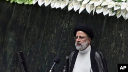 President Ebrahim Raisi delivers a speech after taking his oath as president in a ceremony at the parliament in Tehran, Iran, Aug. 5, 2021.