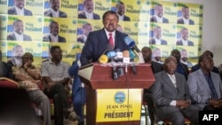 Gabonese opposition leader Jean Ping (C) addresses the media in Libreville, August 29, 2016. Ping on Friday officially challenged the results of the country's August 27 presidential poll, his representative said.