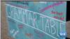 Spanduk program "Grammar Table" di New York (Foto: VOA/videograb)