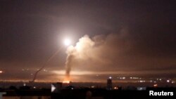 Missile fire is seen from Damascus, Syria, May 10, 2018.