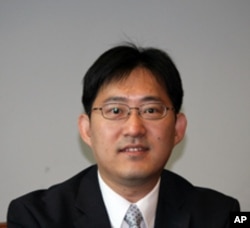 台湾国立政治大学外交系助理教授卢业中