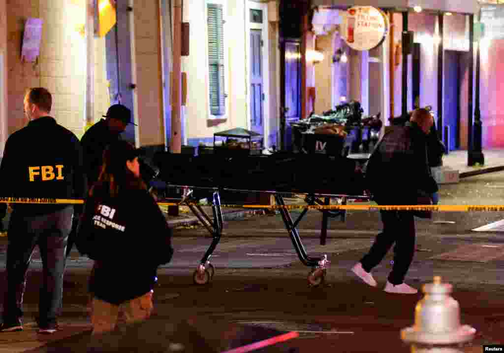 People carry a dead body in a body bag on a stretcher near the site where people were killed by a man driving a truck in an attack during New Year&#39;s celebrations, in New Orleans, Louisiana, Jan. 2, 2025.&nbsp;