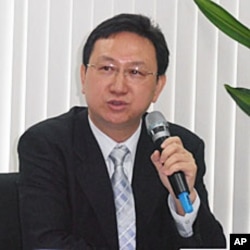 台湾政治大学国家发展研究所教授童振源