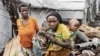 Internally displaced people leave the Lwashi camp in Goma, Democratic Republic of Congo, on Feb. 11, 2025.