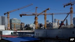 资料照:北京金融区附近的一处建筑工地。(2021年10月11日)