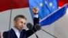 FILE - Multibillionaire Bidzina Ivanishvili, creator of the Georgian Dream party, greets demonstrators during a rally in support of a "foreign agent" law in Tbilisi, Georgia, on April 29, 2024.