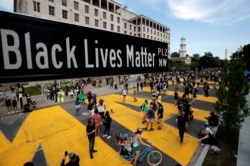 A street sign of Black Lives Matter Plaza is seen near St. John's Episcopal Church, as the protests against the death in Minneapolis police custody of George Floyd continue, in Washington, U.S., June 5, 2020.