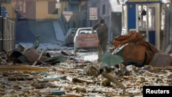 Posljedice granatiranja Donjecka, koji se nalazi pod kontrolom ruskih snaga, 1. januara 2024. godine. (Foto: Rojters/Alexander Ermochenko"