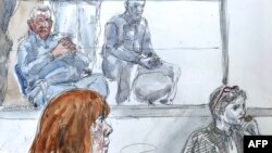 This court sketch made on Dec. 19, 2024, in Avignon, France, shows defendant Dominique Pelicot, left, and his lawyer, Beatrice Zavarro, right, during his sentencing for the mass rapes of his ex-wife, Gisele Pelicot, bottom left.