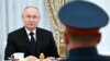 FILE PHOTO: Russian President Putin meets with servicemen involved in Russia-Ukraine conflict, in Moscow