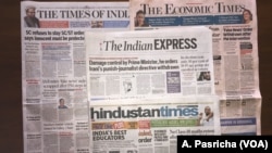 Indian Prime Minister Narendra Modi withdraws government order to suspend press credentials of reporters accused of spreading fake news following media outcry that it opened the door to make journalists fall in line. 