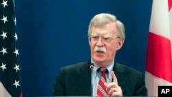 ARSIP - Penasihat keamanan nasional AS, John Bolton, berbicara kepada media setelah pertemuannya dengan para pejabat Georgia di Tbilisi, Georgia, 26 Oktober 2018 (foto: AP Photo/Shakh Aivazov).