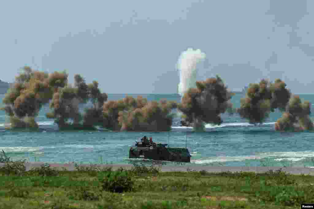 Smoke rises from an amphibious assault vehicles (AAV) participating in the "Cobra Gold 2025” (CG25) joint military exercise at a military base in Chonburi province, Thailand.