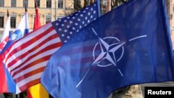 Detalj sa proslave pristupanja Letonije NATO-u, 28. marta 2024. godine (Foto: Rojters/Ints Kalnins)