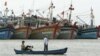 FILE - Vietnamese fishermen paddle their boat in Vung Tau, 125 kilometers (77 miles) southeast of Vietnam's Ho Chi Minh city.