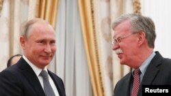 博尔顿2018年10月23日会见普京（路透社）