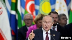 Presiden Rusia Vladimir Putin berpidato pada KTT BRICS di Kazan, Rusia, 23 Oktober 2024. (ALEXANDER NEMENOV/Pool via REUTERS)