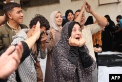 Palestinians mourn relatives killed in Israeli bombardment, at the al-Najjar hospital in Rafah in the southern Gaza Strip, April 29, 2024 amid the ongoing conflict between Israel and the Palestinian militant group Hamas.