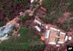 FILE - This Wednesday, May 23, 2018 satellite file image provided by DigitalGlobe, shows the Punggye-ri test site in North Korea.