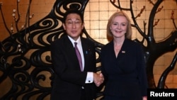 英国新首相特拉斯2022年9月20日在纽约出席联合国大会期间会见日本首相岸田文雄。（媒体联访照片）