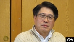 台湾民意基金会董事长游盈隆