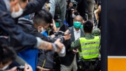 资料照：香港壹传媒创办人黎智英离开终审法庭（法新社2021年2月9日）