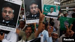 Supporters of former President Pervez Musharraf in Karachi, Pakistan on April 6, 2014. 