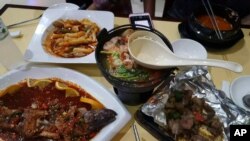 This photo shows North Korean-recommended dishes at the Pyongyang A Ri Rang Restaurant in Bangkok, Thailand, Feb. 18, 2016.