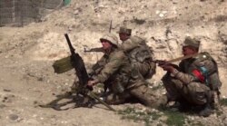 An image from a video made available on the website of the Azerbaijani Defence Ministry on Sept. 28, 2020, allegedly shows Azeri troops conducting a combat operation during clashes between Armenian separatists and Azerbaijan in Nagorno-Karabakh.