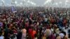 Devotees gather to take a dip at the confluence of the Ganges and Yamuna rivers during the Maha Kumbh Mela, or the Great Pitcher Festival, in Prayagraj, India, on Feb. 12, 2025.