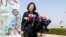 Taiwanese President Tsai Ing-Wen standing by a section of the Berlin Wall speaks to media at the Ronald Reagan Presidential Library in Simi Valley, California, Aug.13, 2018. 