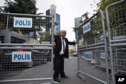 A guard secures the entrance of the Saudi Arabia's Consulate in Istanbul, Oct. 17, 2018.