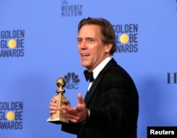 Hugh Laurie holds the award for Best Performance by an Actor in a Supporting Role in a Series, Limited Series or Motion Picture Made for Television for his role in "The Night Manager" during the 74th Annual Golden Globe Awards in Beverly Hills, California
