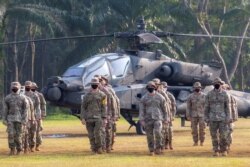Tentara Angkatan Darat AS ambil bagian dalam pembukaan Latihan MIliter Gabungan Garuda Shield 2021 di Pusat Pelatihan Tempur Angkatan Darat Indonesia di Baturaja, provinsi Sumatera Selatan, 4 Agustus 2021. (Antara Foto/Nova Wahyudi/via Reuters)