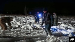 Wasu daga cikin tarkacen jirgin saman Rasha da ya fado