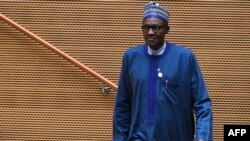 Nigeria's President Muhammadu Buhari walks after speaking at the opening of the Ordinary Session of the Assembly of Heads of State and Government during the 30th annual African Union summit in Addis Ababa, Ethiopia, Jan. 28, 2018.