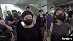 2021 年4 月 22 日香港电台前外判编导蔡玉玲离开法庭